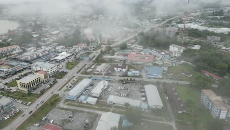 foggy morning beautiful drone view of sri aman town at batang lupar river, during regatta and pesta benak,sarawak, borneo.