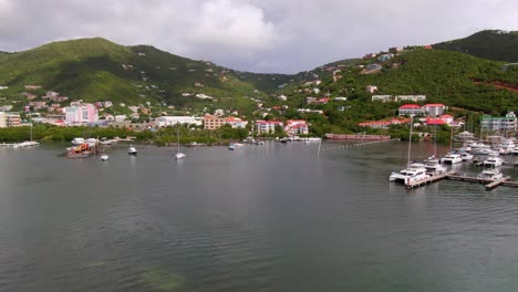 Aerial-pull-in-rising-shot-showing-housing-area-on-Caribbean-island