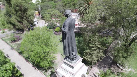 statue of miguel hidalgo in a downtown garden