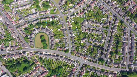 explore the charm of a meticulously planned neighborhood with this stunning drone footage showcasing beautifully designed roads and homes from a top-down perspective