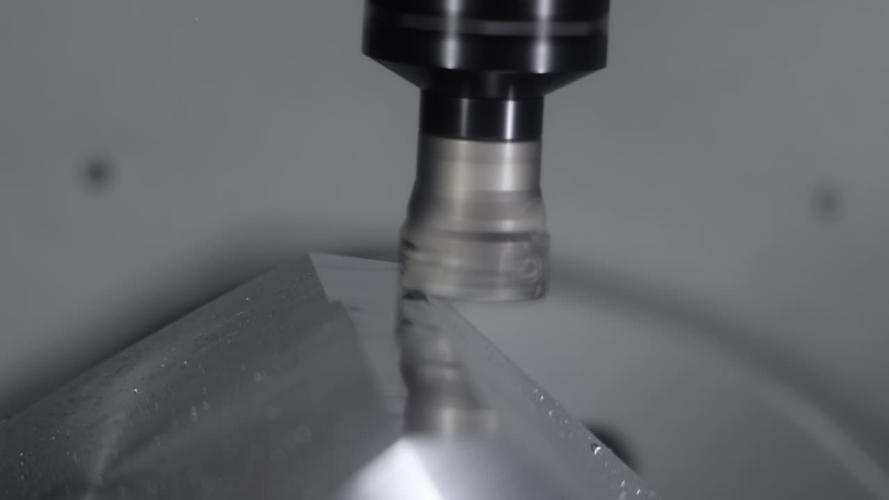 Metalworking CNC milling machine. Cutting metal modern processing technology.