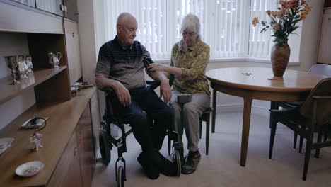 elderly couple managing health at home