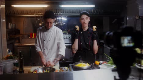 cooking show featuring chefs preparing potatoes and onions