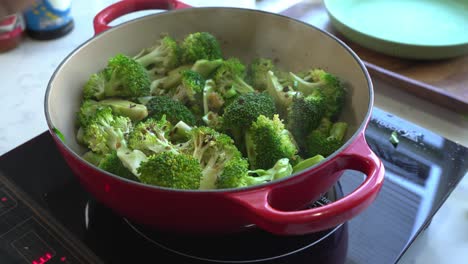 sautéed broccoli in a red pot