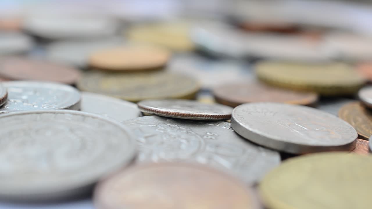 Coins of the different countries of the world. Coins in the movement