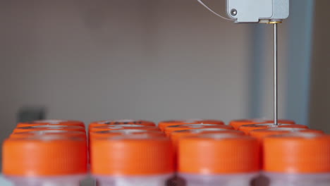 a closeup of the sterile medical lab machine performs the analysis automatically on detection of cancer by analysis of a puncture