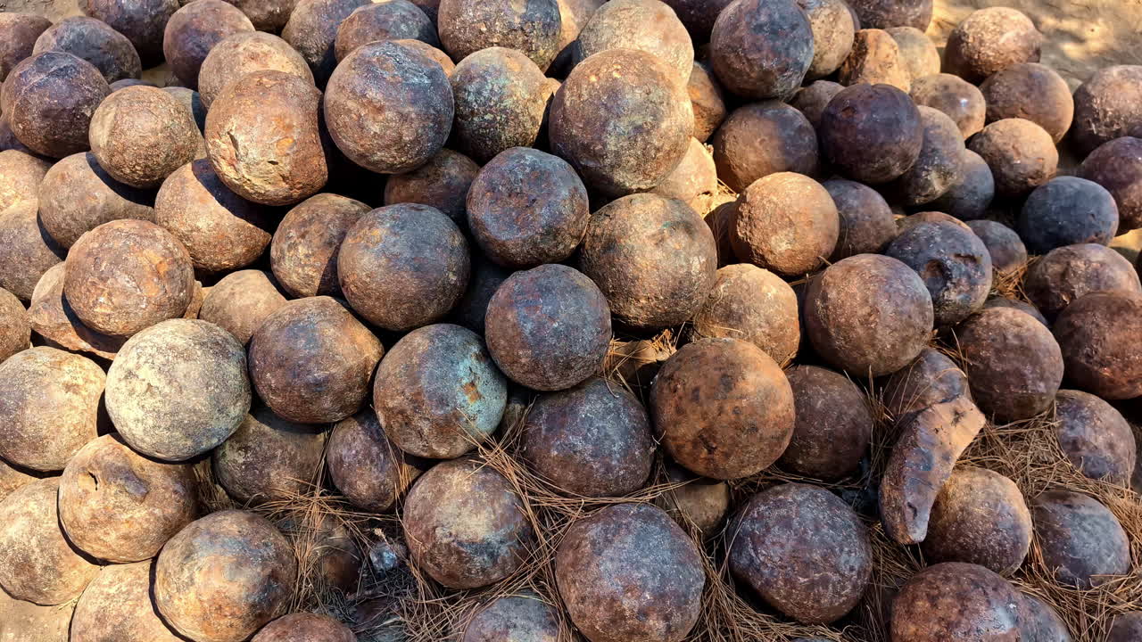 Pile Of Coconuts On A Sunny Day In Greece. - high angle shot