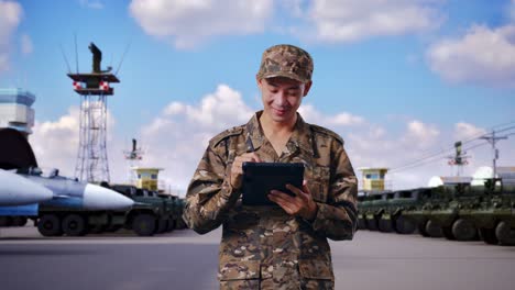 military personnel using tablet at base