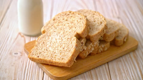 sliced wholegrain bread on a wooden table