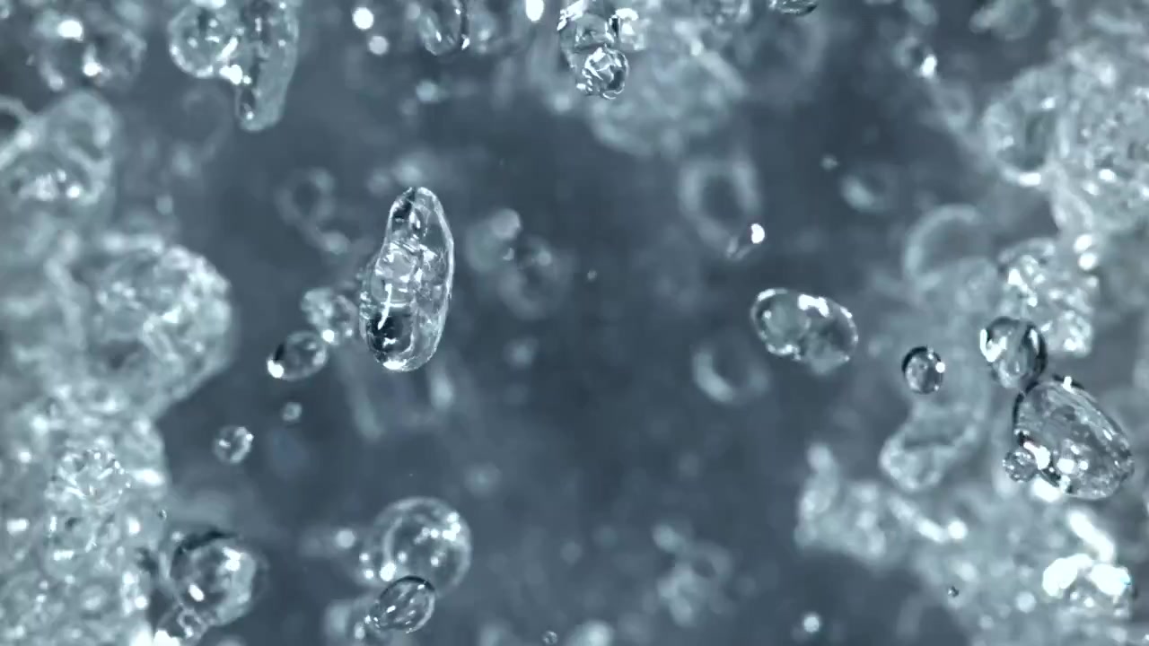 スローモーションの水滴と泡の抽象的な背景