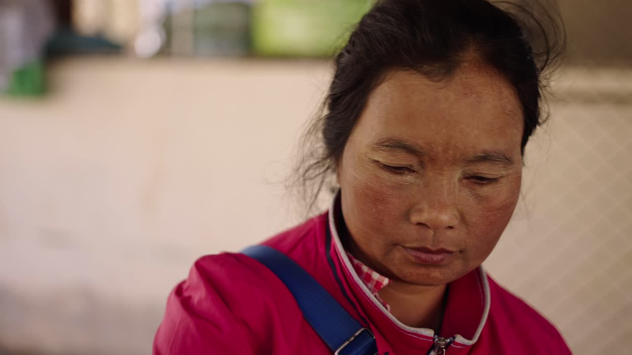 Portrait of an Asian woman with traditional face makeup