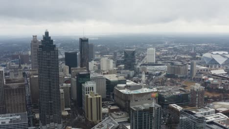 drone shot above midtown atlanta on a cloudy day after a storm