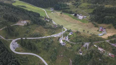 Aerial-View-of-Neighborhood-in-Bontveit,-where-Cars-are-parked-along-the-road