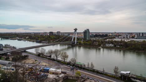 SNP-or-New-Bridge-time-lapse-in-Bratislava,-Slovakia,-blurry-traffic-motion