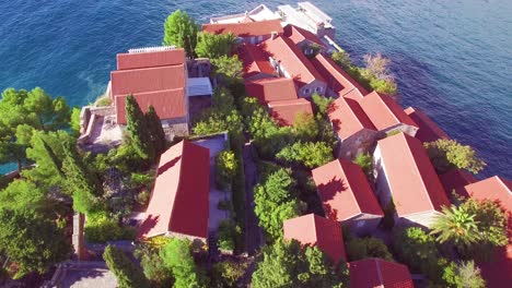 remarkable aerial shot over the beautiful sveti stefan island in montenegro 6