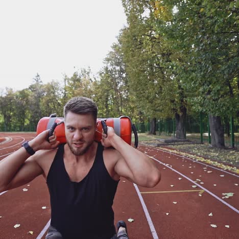. young man doing workout. man doing fitness workout outdoors
