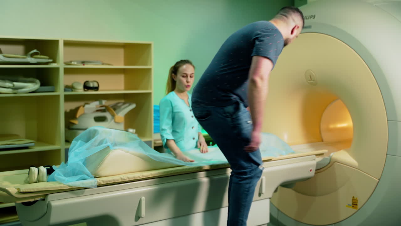 Magnetic resonance imaging scan. Patient during magnetic resonance imaging in hospital