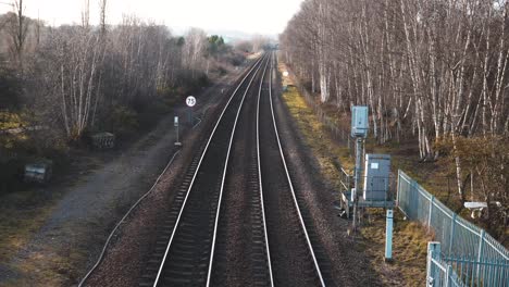 Panning up from above the railway tracks