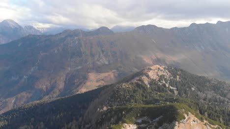flying in julian alps with storm clouds in background