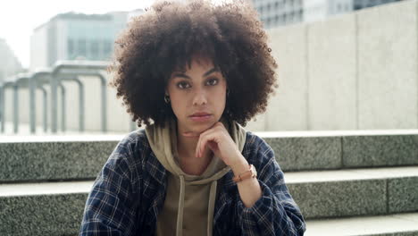 an attractive young woman sitting alone