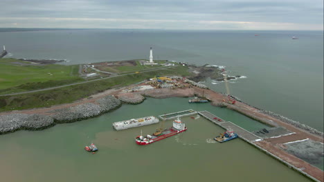 aerial view of construction work on the new aberdeen south harbour at nigg bay on a cloudy day