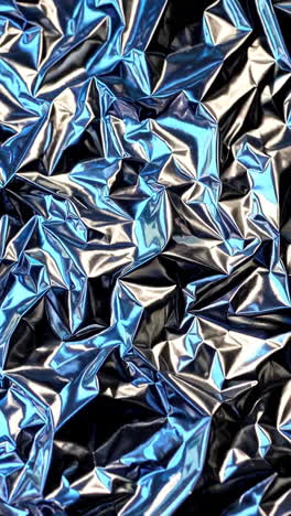 crumpled iridescent metal texture
