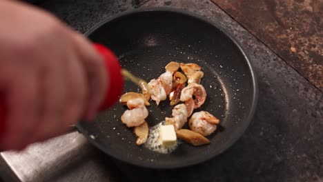 cooking shrimp in a pan