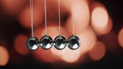 balls in newton's cradle