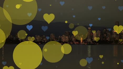 animation of spots and hearts over cityscape