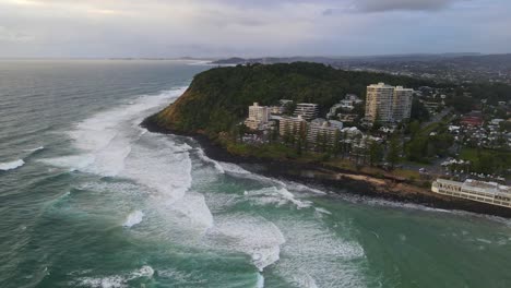 resort structures and the city landscape of burleigh heads at the oceanfront of burleigh beach in australia