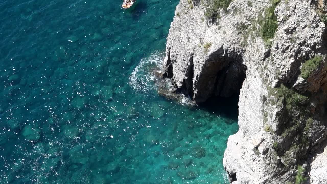 natural cave and cliffs on the coast of Montenegro, Europe. Calypso beach