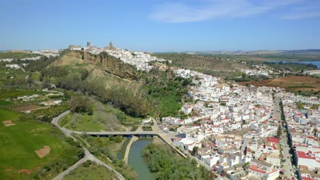 Agricultural-fields-near-cliff-and-town