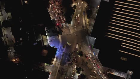 aerial hyperlapse of a chaotic illuminated intersection in cdmx, night time