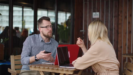 business meeting in outdoor cafe