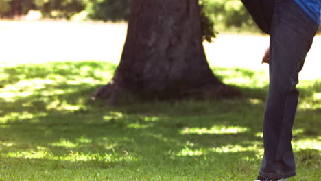 Child in slow motion kicking a soccer ball