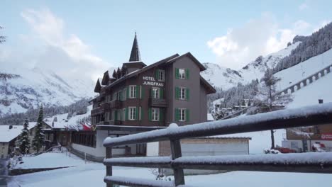 hotel jungfrau in the swiss alps covered in snow