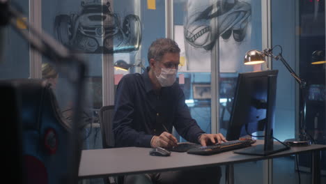 designer working on a computer in a modern design studio