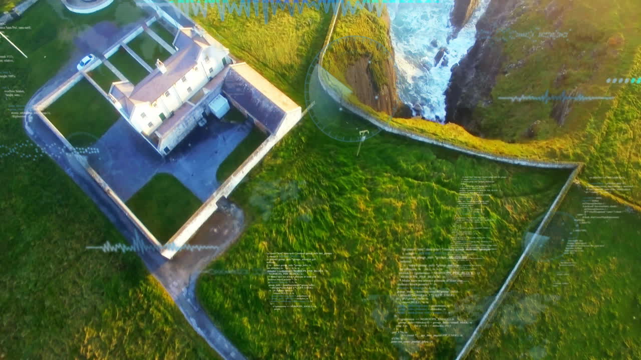Aerial view of coastal house with data processing animation over green landscape