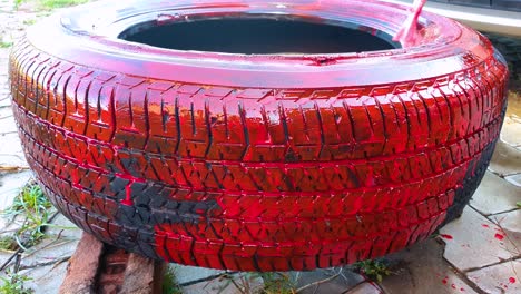 reusing old abandoned car tire as planter