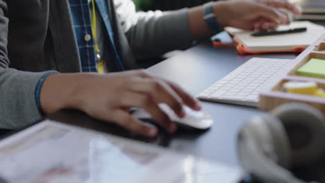 close-up-hands-business-man-reading-corporate-documents-brainstorming-ideas-writing-notes-using-computer-planning-strategy-in-modern-startup-communication-company