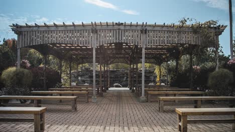 beautiful outdoor pergola wedding venue during the fall at orchard view wedding and event centre