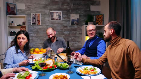 Two-sons-having-a-conversation-with-their-father