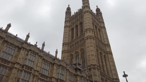 climate change protestors lobby along the banks of the thames and outside the houses of parliament as part of the time is now protest
