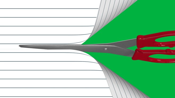 Animation of scissors cutting white ruled paper background