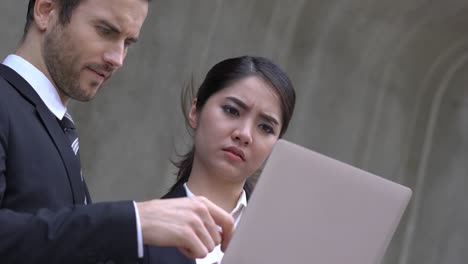 businessman and businesswoman talking discuss project together. concept of project management, business meeting, strategy and performance.