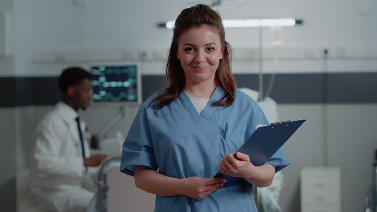 Portrait of medical assistant holding checkup documents