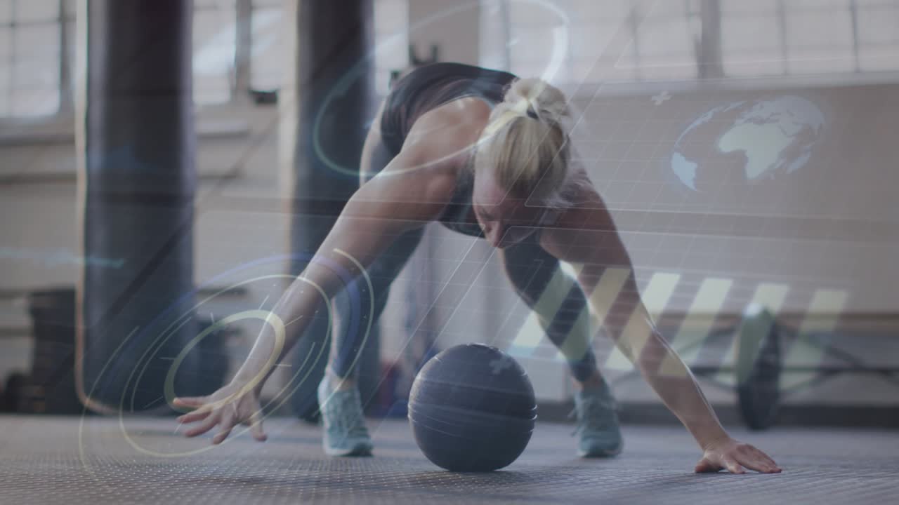 Female athlete reacting to digital graphics, alternating medicine-ball push-ups for core fitness