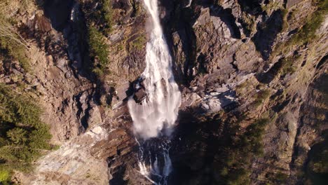 aerial drone footage pushing in and orbiting counterclockwise at fallbach in grindelwald