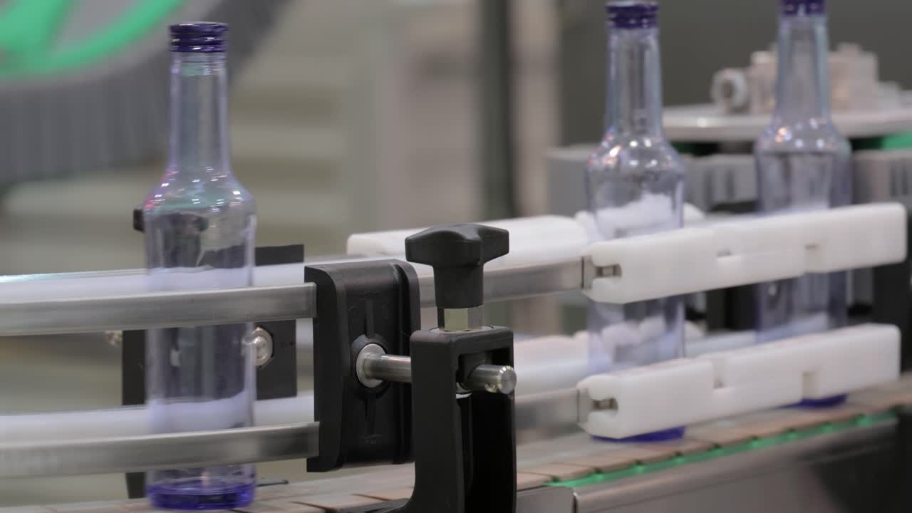 Bottles on production line plant or factory