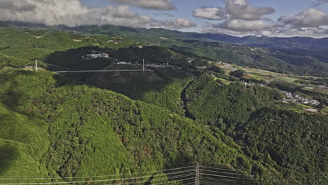 mishima japan aerial v5 high altitude drone flyover sasahara shinden capturing sky walk bridge spanning across verdant valleys and rolling hills landscape - shot with mavic 3 pro cine - october 2023